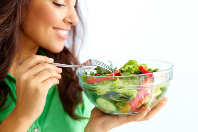 woman eating healthy foods for her diet